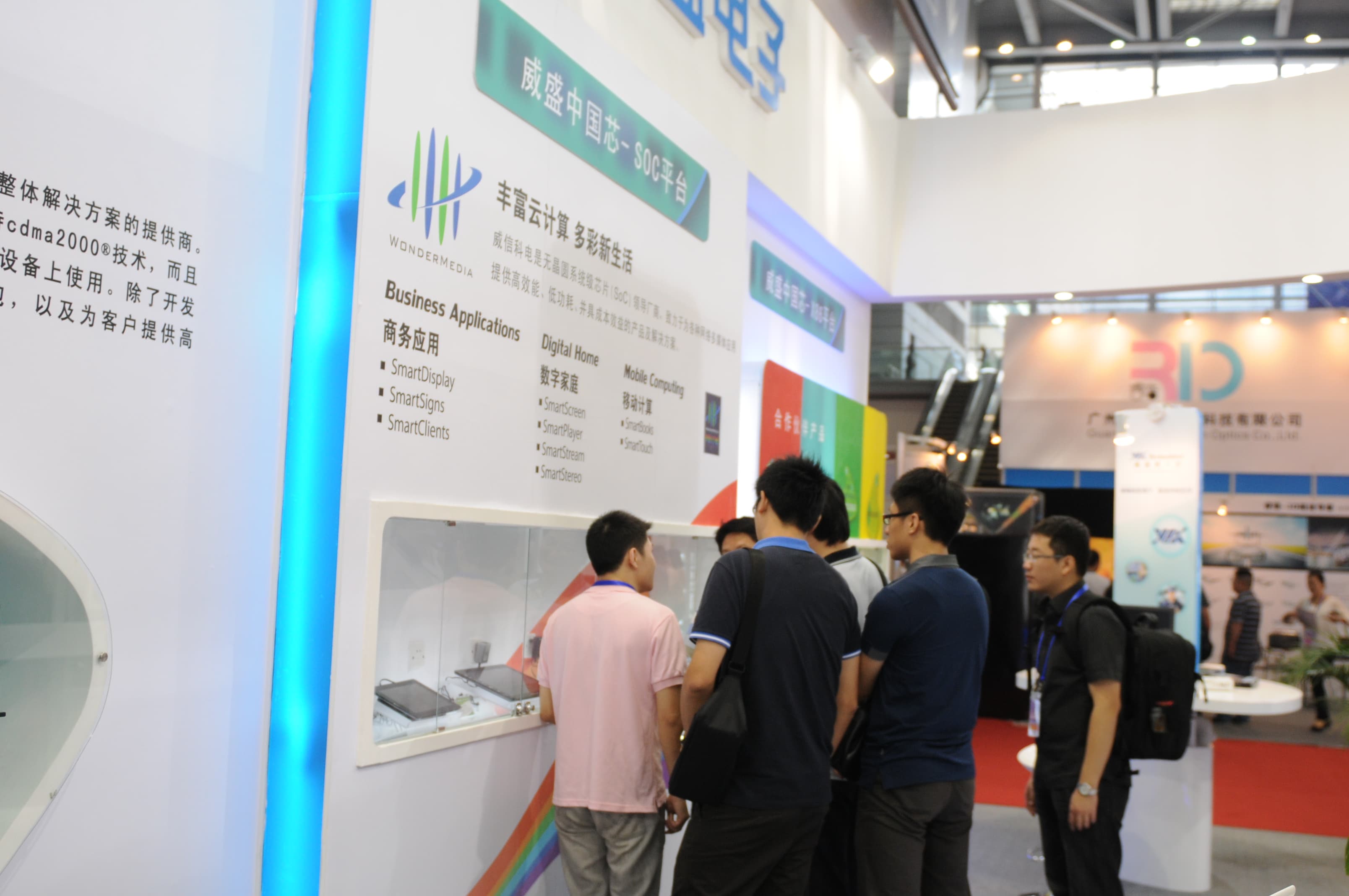Visitors exploring product displays at a design trade show